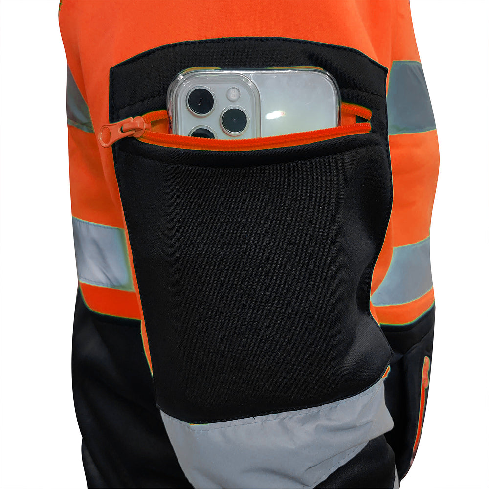 Black pocket on an orange and gray safety jacket with a phone inside.